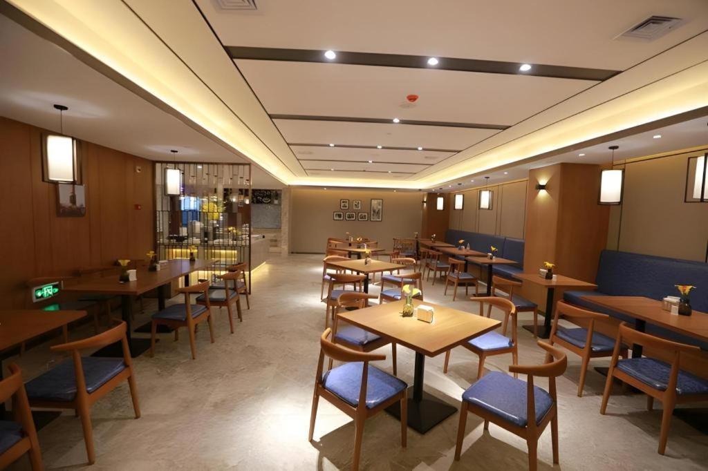 和颐至尚酒店哈尔滨火车站邮政广场秋林店 外观 照片
